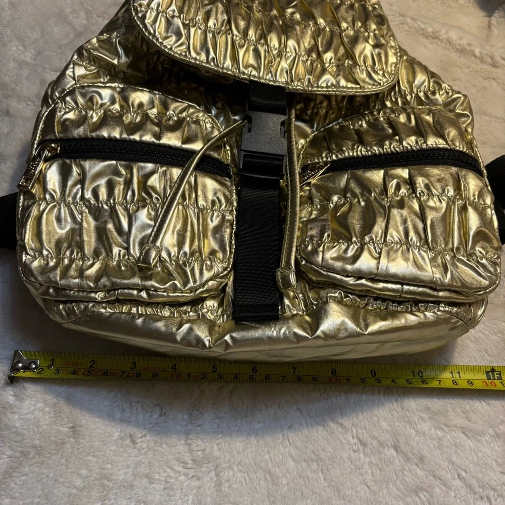 NWT Madden Girl Backpack Metallic Gold Quilted Drawstring Shiny Black Zip Straps